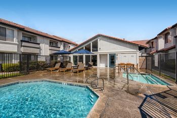 Glistening swimming pool with spa 